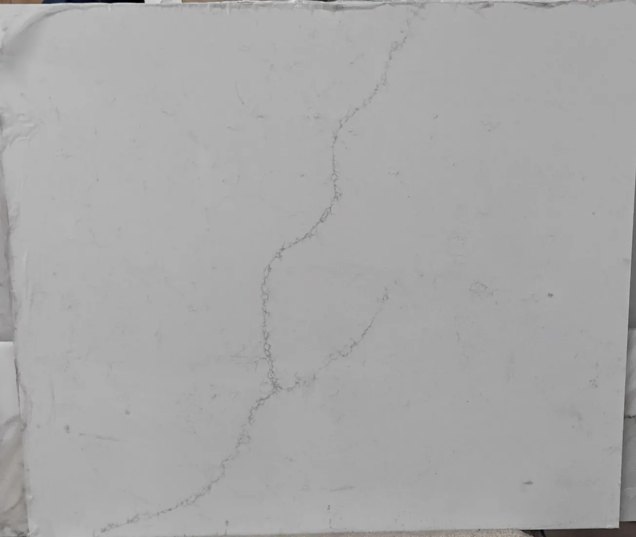 Calacatta rusta · Quartz · 3 cm · polish · 55" x 48"