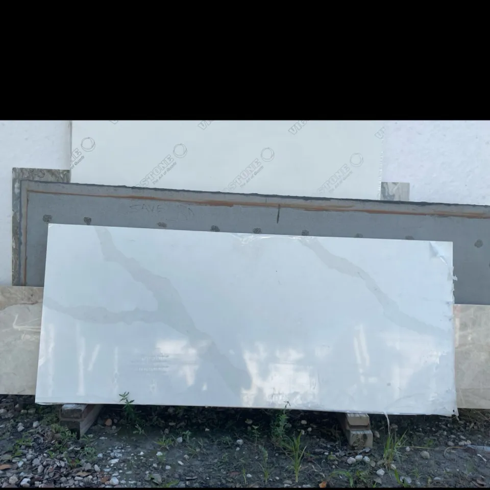 Calacata Belaros · Quartz · 3 cm · polish · 30" x 71"